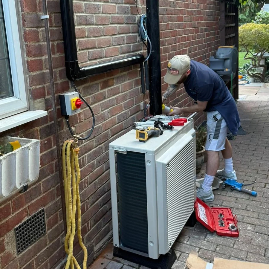 Someone installing a HVAC system